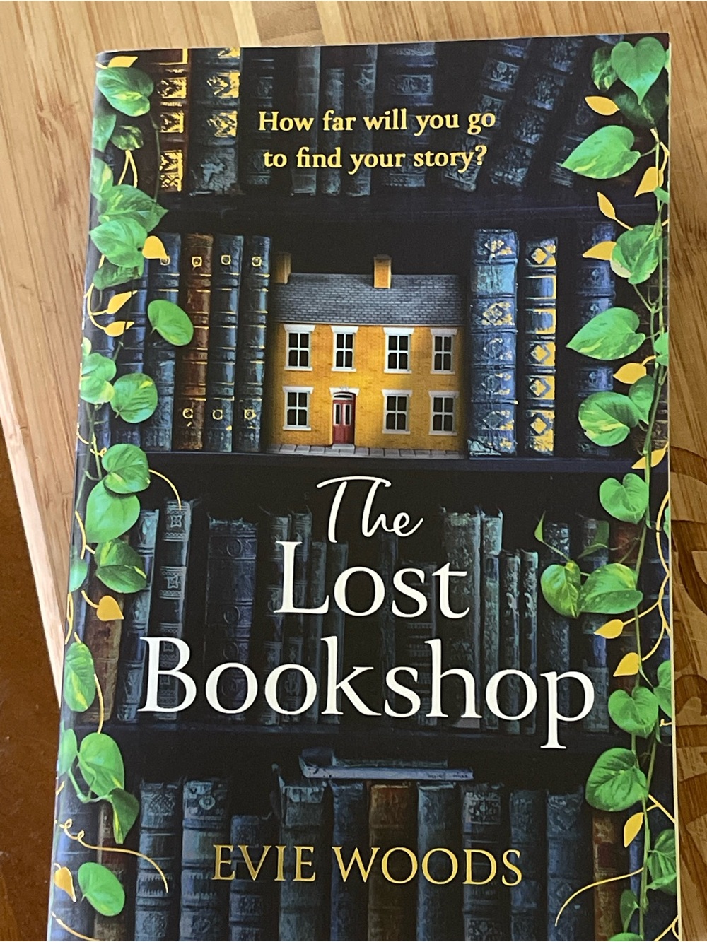The Lost Bookshop by Evie Woods - Deep Blue & Gold Cover